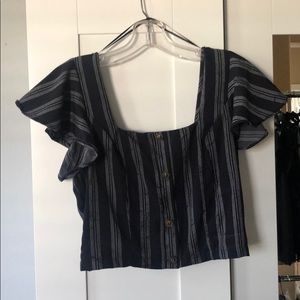 Navy blue and white over the shoulder top